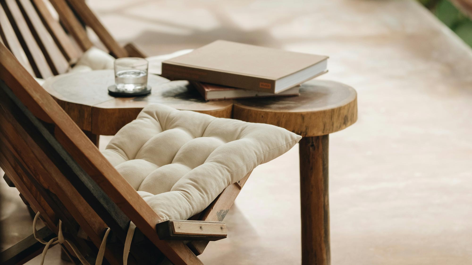 loungers with book and drink