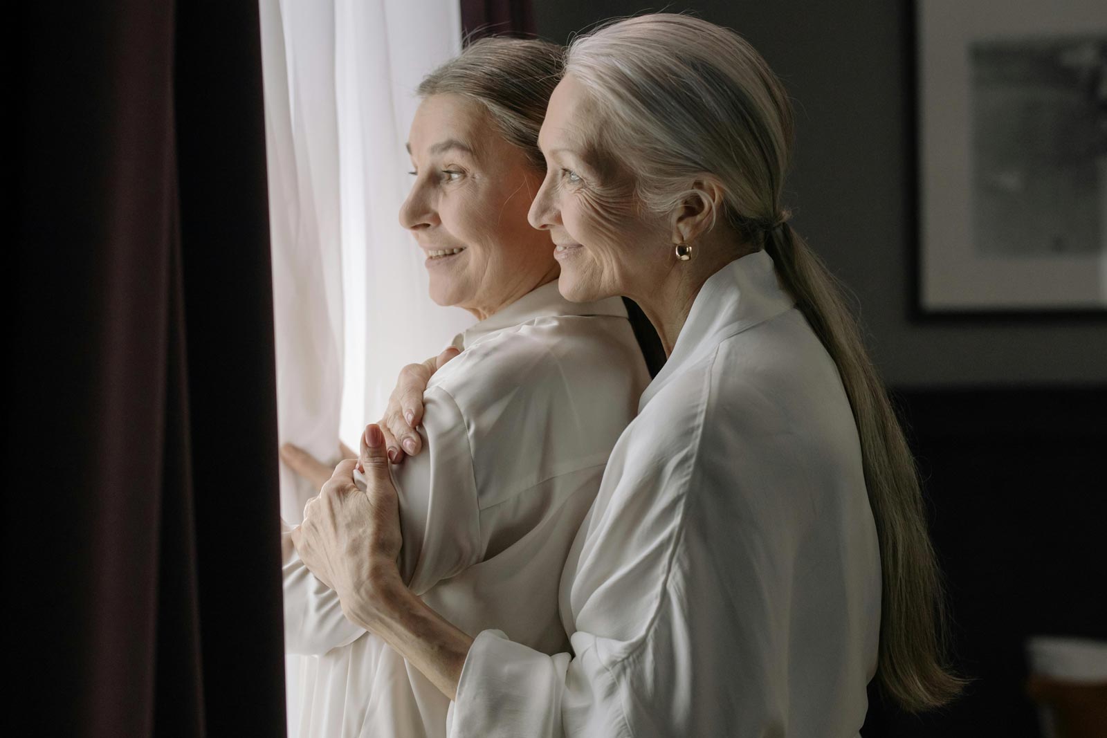 Two ladies enjoying view from inside